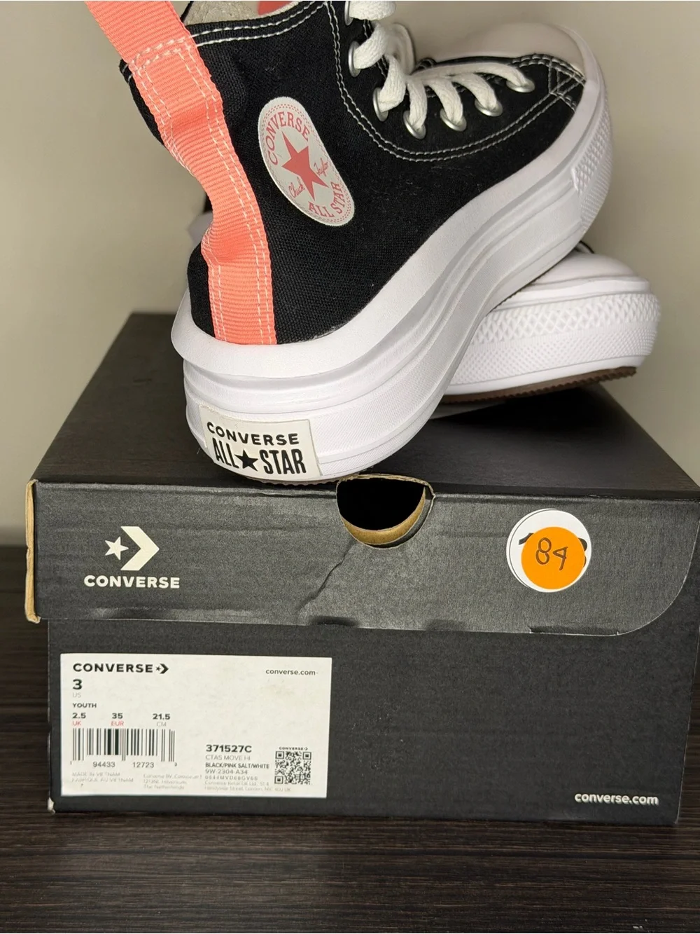Converse Black High-Top Platform Sneakers with Coral Pull Tab
